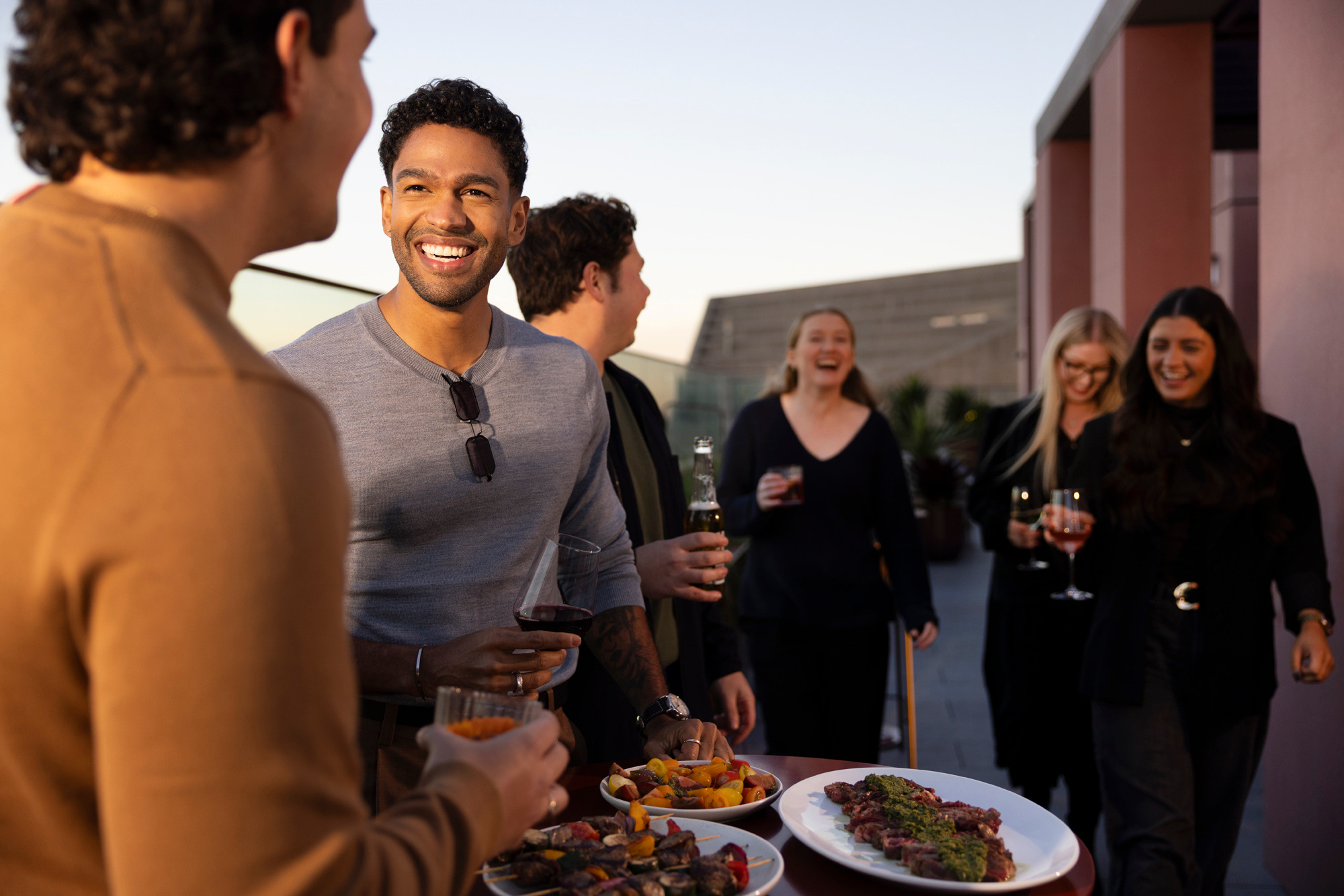 Residents enjoying Indi rooftop